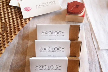 Original Axiology lipstick boxes with cover-up stickers